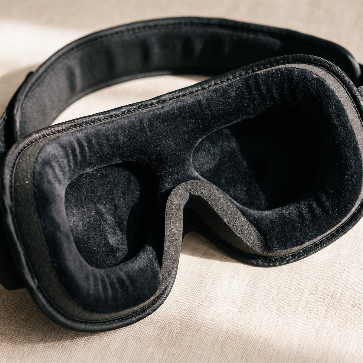 Inside of the blackout eye mask showing the moulded cups
